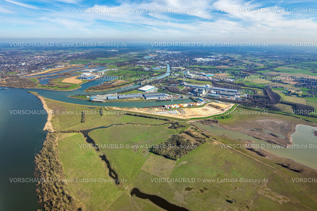 Voerde240310867 | Luftbild, Hafen Emmelsum, Fluss Rhein mit Rheinaue und Wesel-Datteln-Kanal mit Schleuse Friedrichsfeld, Sappi Logistics Wesel GmbH Logistikdienst und TRIMET Aluminium SE, Blick nach Friedrichsfeld und Fernsicht, Emmelsum, Voerde, Nordrhein-Westfalen, Deutschland