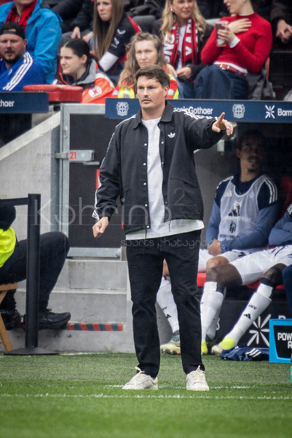 German Bundesliga, Bayer 04 Leverkusen vs. Hamburger SV, 16.05.2026 | LEVERKUSEN, GERMANY - MAY 16, 2026 :  Merlin Polzin (Head Coach Hamburger SV) gestures during the German Bundesliga match on gameday 34 between Bayer 04 Leverkusen vs. Hamburger SV at BayArena on May 16, 2026 in Leverkusen, Germany. DFL REGULATIONS PROHIBIT ANY USE OF PHOTOGRAPHS AS IMAGE SEQUENCES AND/OR QUASI-VIDEO.