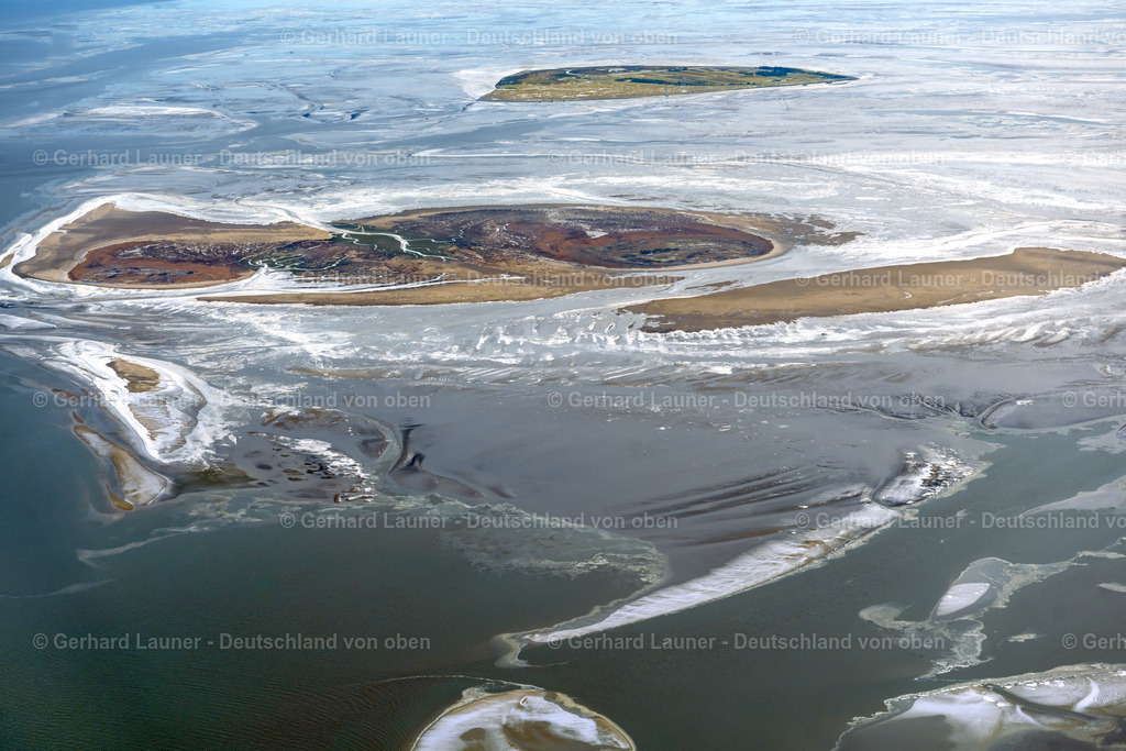 4044432 | NIGEHöRN 14.02.2021 Winterlich schneebedeckte Küstenbereich der Nordsee - Insel in Scharhörn Nigehörn im Bundesland Hamburg. // Wintry snowy coastal area of the North Sea - Island in Scharhoern in the state Hamburg. Foto: Gerhard Launer