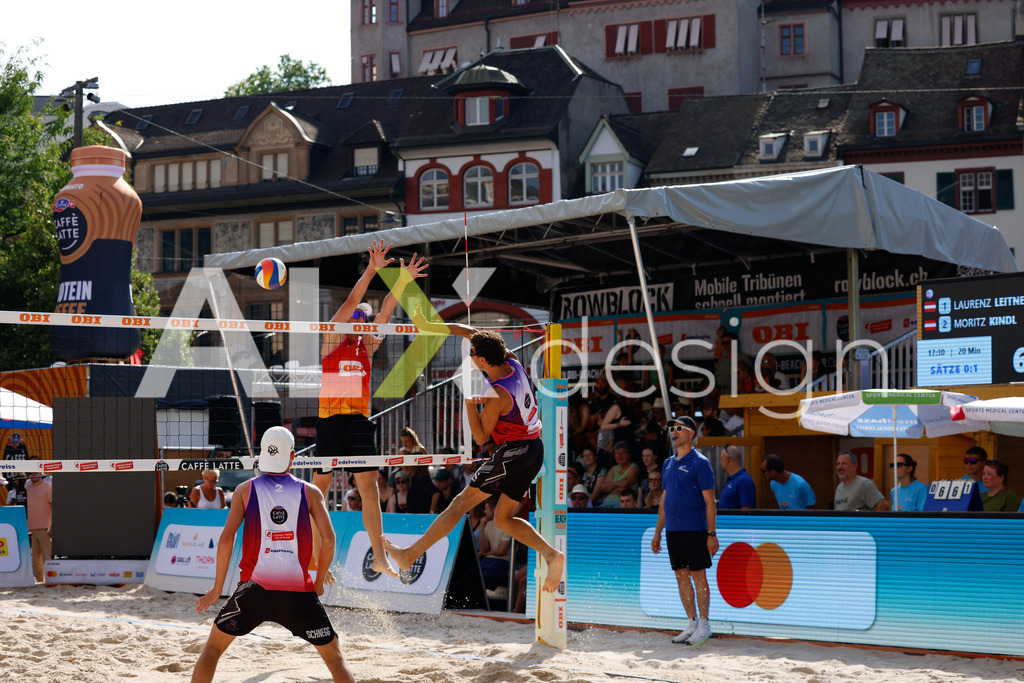 Obi BeachTour 2026 - Basel | BASEL, SWITZERLAND - JULY 17: MAËL MASSEREY (SUI) attack / spike against LAURENZ LEITNER (AUT) during the Obi BeachTour 2026 match between LEITNER / KINDL (AUT) and MASSEREY / SCHNEGG (SUI) at Barfüsserplatz on July 17, 2026 in Basel, Switzerland. - Realisiert mit Pictrs.com