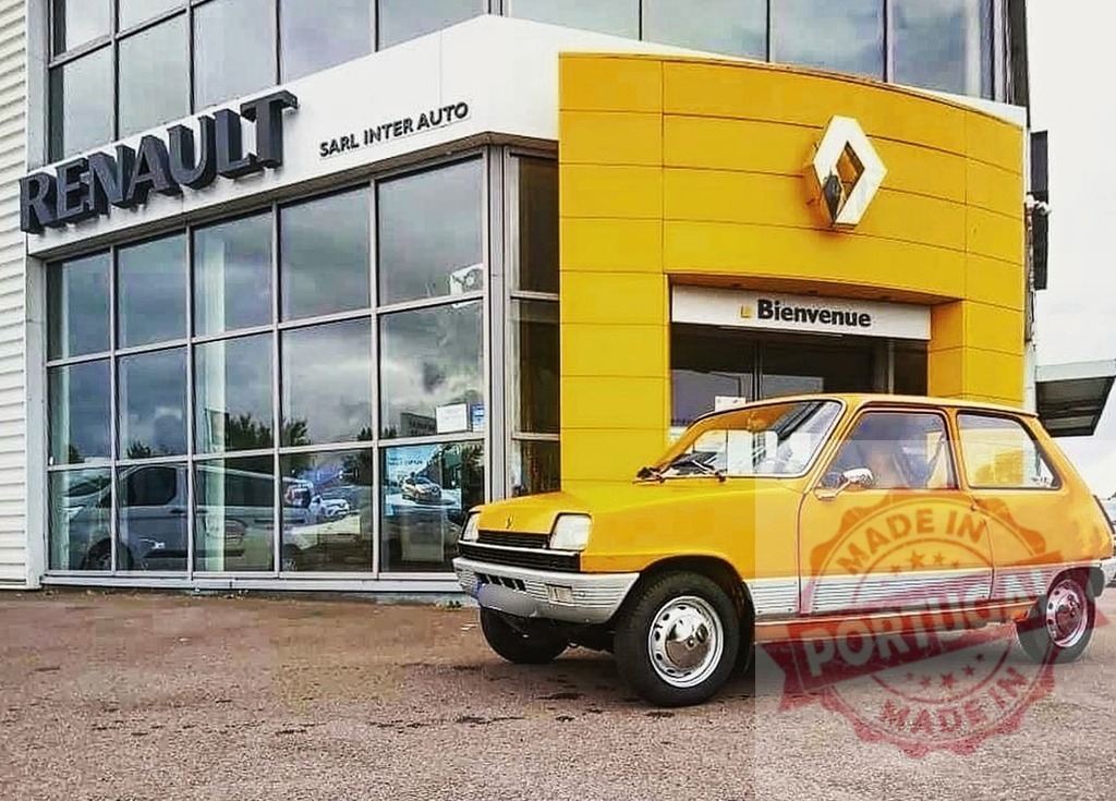 Yellow Renault 5 car parked at Renault dealership | Yellow Renault 5 vintage hatchback car parking outside a modern Renault automotive dealership - Realisiert mit Pictrs.com