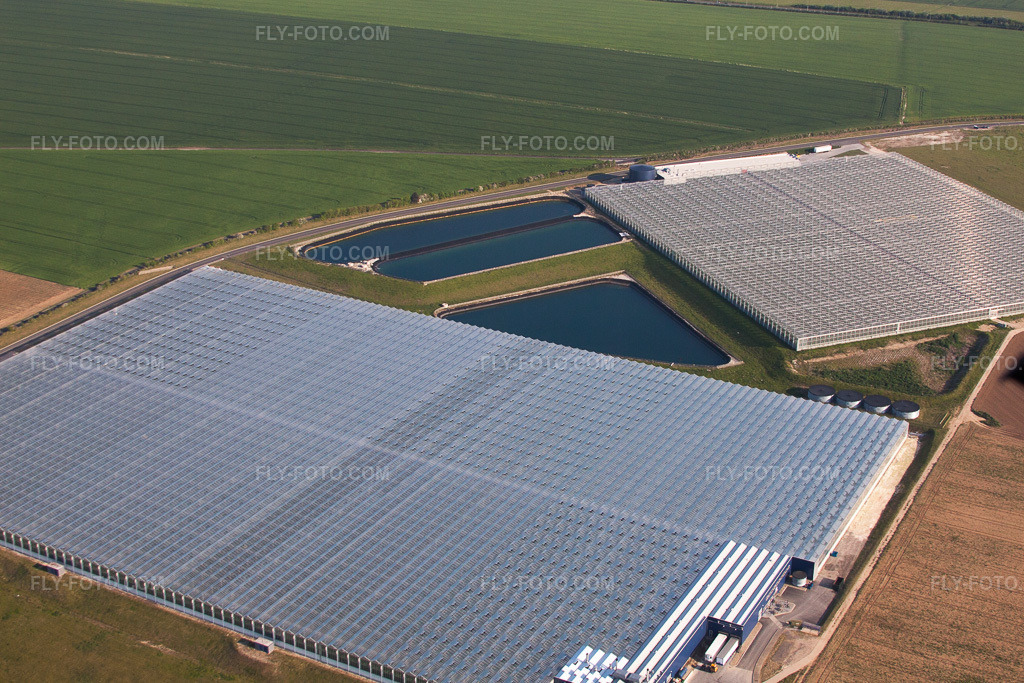Aerial view: Glass roof areas in Thanet Earth's greenhouse rows for vegetable cultivation in Birchington-on-Sea in the state England, Great Britain.Photo: IMG_50442.jpg taken on 05/27/2012 by Werner Riehm/FLY-FOTO.comResolution of the original: 4188 x 2792 pxThanet Earth - Thanet Earth
