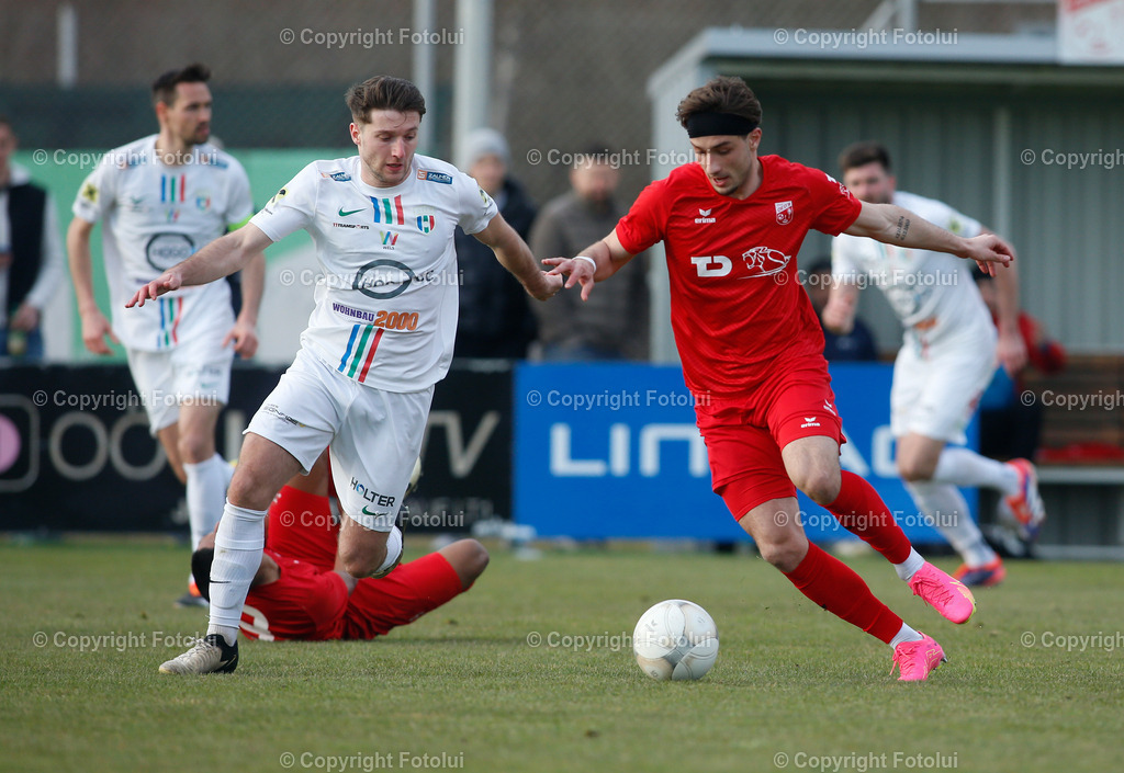 A_LUI_22032025_22 | SPORT,FUSSBALL,REGIONALLIGA MITTE ASKOE OEDT-HERTHA WELS 22.03.2025 IM BILD: BEN TRAVIS WOERNDL  (OEDT) UND HANNES HUBER  (WELS) FOTO:FOTOLUI
