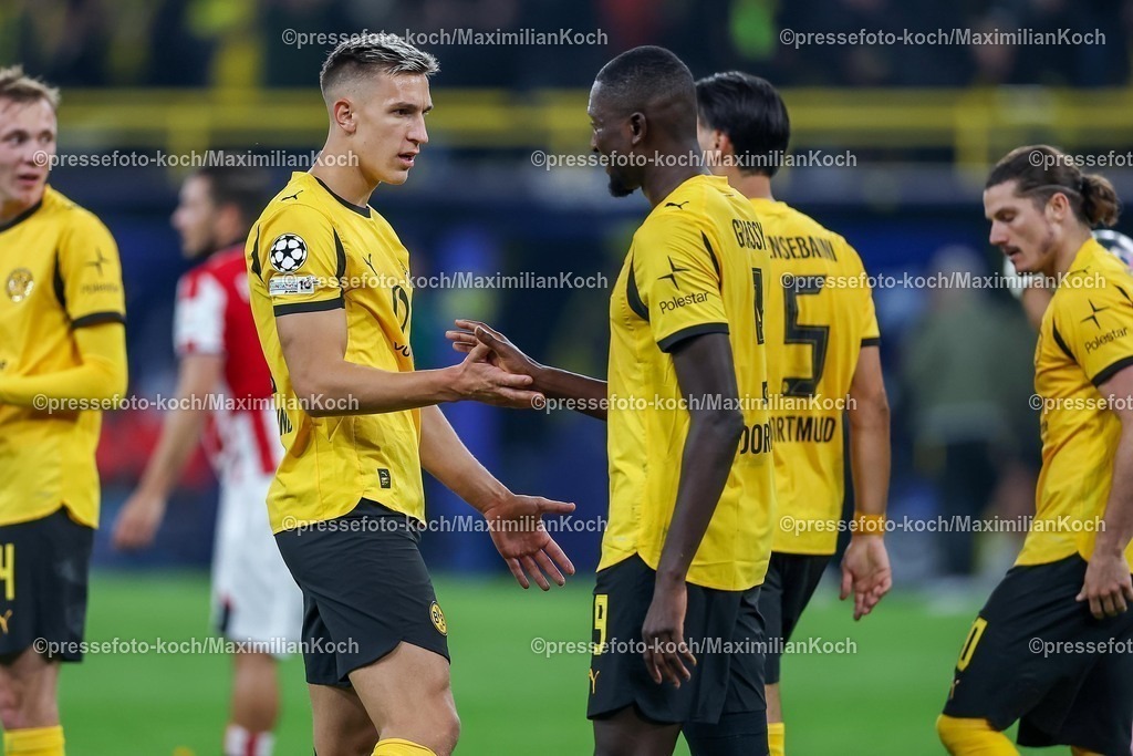 UCL01102501242 | 01.10.2025, Fußball, UEFA Champions League, Borussia Dortmund - Athletic Club Bilbao, BVB Stadion, 2. Spieltag, Saison 2025 2026: Torjubel nach dem Tor zum 3:1 durch Torschütze Serhou Guirassy (BVB #09) und Marcel Sabitzer (BVB #20)  zusammen mit Nico Schlotterbeck (BVB #04) Regulations prohibit any use of photographs as image sequences and or quasi-video.