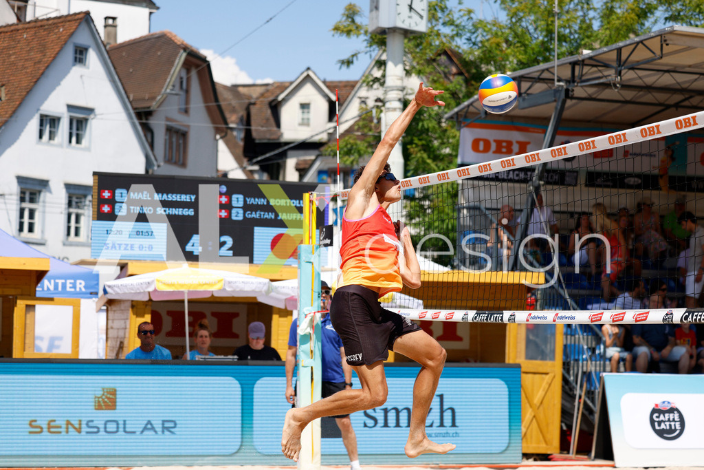 Obi BeachTour 2026 - Basel | BASEL, SWITZERLAND - JULY 18: MAËL MASSEREY (SUI) attack / spike during the Obi BeachTour 2026 match between MASSEREY / SCHNEGG (SUI) and BORTOLUZZI / JAUFFRET (SUI) at Barfüsserplatz on July 18, 2026 in Basel, Switzerland. - Realisiert mit Pictrs.com