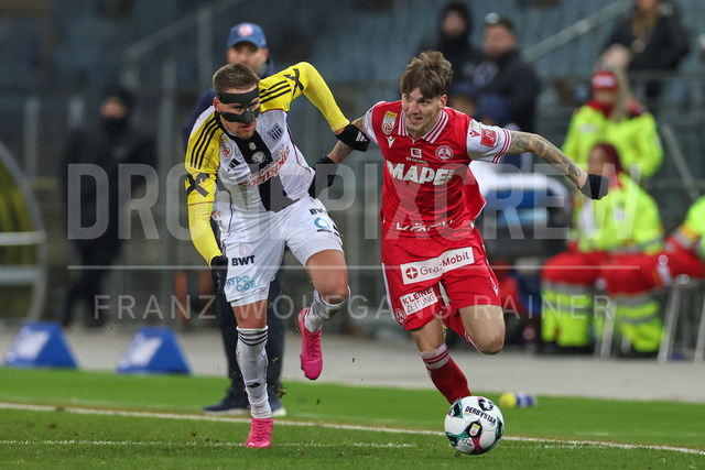 Austrian Bundesliga: Grazer AK 1902 vs LASK | GRAZ, AUSTRIA, 13.DEC.25 - SOCCER - ADMIRAL Bundesliga, Grazer AK 1902 vs LASK. The image shows Kasper Jörgensen (Lask) and Tio Cipot (GAK).