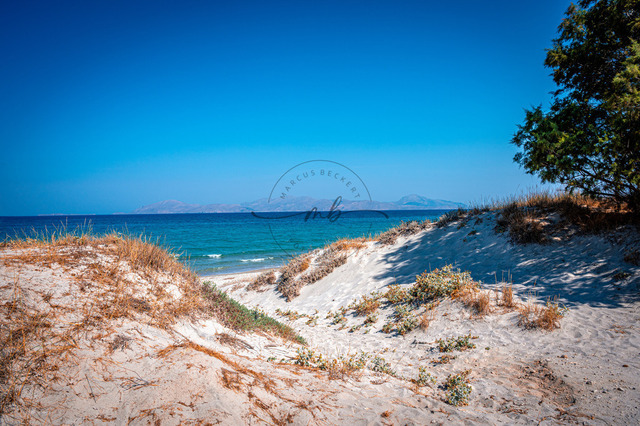Strand auf der Insel Kos | Blick auf den Strand von Mastichari auf der Insel Kos, Mastichari, Kos, Griechenland - Realisiert mit Pictrs.com