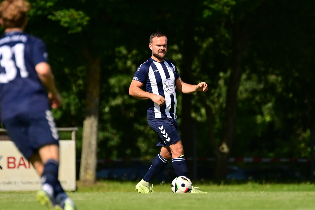 Fußball I Herren I Saison 2025-2026 I Bezirksliga I 1. Spieltag I Buchholzer FC - MTV Soltau | Der Sportfotograf. - Realisiert mit Pictrs.com