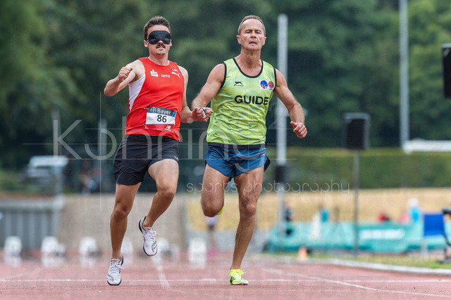 Para Heimspiel 7.0; Leverkusen, 18.07.2026 | LEVERKUSEN, GERMANY - JULY 18, 2026 : Marcel Boettger (GER/LG Olympia Dortmund) and his guide Alexander Kosenkow competing in the 100m during the Para Heimspiel 7.0 at Fritz Jacobi Sports Complex on July 18, 2026 in Leverkusen, Germany.
