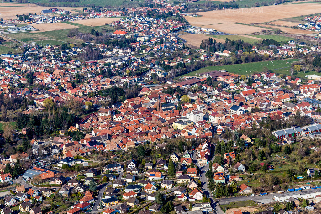Aerial view: Pfaffenhoffen in Val-de-Moder in the state Bas-Rhin, France. – Photo: IMG_097500.jpg taken on 03/16/2017 by Werner Riehm/FLY-FOTO.com – Resolution of the original: 5472 x 3648 px