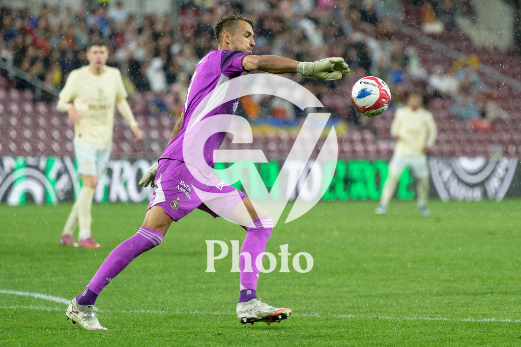 UEFA Conference League Play-offs 2nd leg - Servette FC v FC Shakhtar Donetsk | Joel Mall (1 Servette FC) shoots the ball (action)  during the UEFA Conference League Play-offs 2nd leg match between Servette FC and FC Shakhtar Donetsk at Stade de Geneve in Geneva, Switzerland
