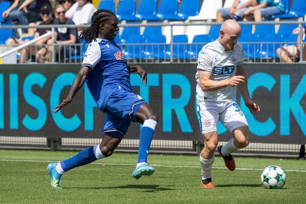 Fußball 3. Liga, Saison 2026/27, 1. Spieltag: TSG Hoffenheim 2 gegen Hansa Rostock | Fußball 3. Liga, Saison 2026/27, 1. Spieltag: TSG Hoffenheim 2 gegen Hansa Rostock***Maximilian Krauß (35, Rostock) und Miguel Blessing Makanda (17, Hoffenheim) - Realisiert mit Pictrs.com