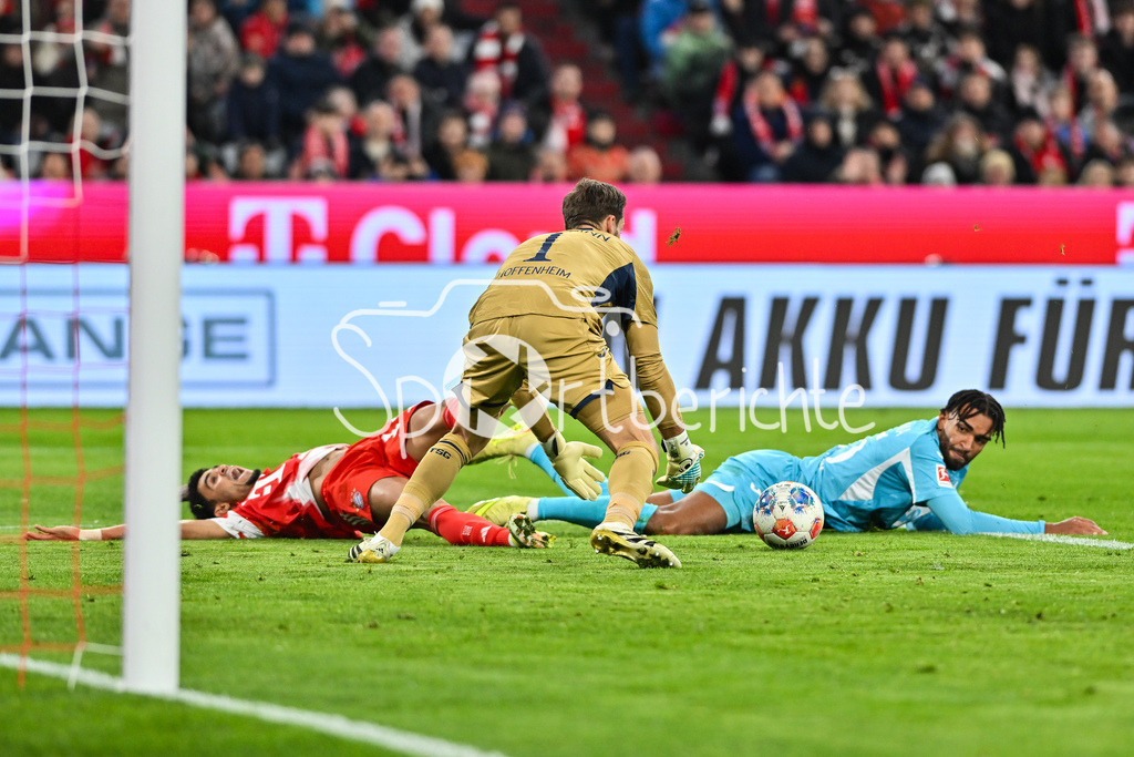 FC Bayern München - TSG 1899 Hoffenheim | MUNICH, GERMANY - 08. FEBRUARY: strittige Szene - Luis DIAZ (FC Bayern Munich 14) im Duell mit Kevin AKPOGUMA (TSG Hoffenheim 25), Oliver Baumann (TSG Hoffenheim 1) / Elfmeter / rote Karte / Zweikampf während dem Bundesligamatch zwischen dem FC Bayern München und der TSG 1899 Hoffenheim am 21. Spieltag in der Allianz Arena / DFL REGULATIONS PROHIBIT ANY USE OF PHOTOGRAPHS AS IMAGE SEQUENCES AND/OR QUASI-VIDEO