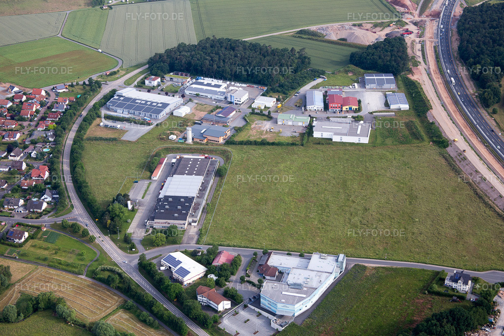 Luftbild: Industriegebiet Ob. Grüben im Ortsteil Bettingen in Wertheim im Bundesland Baden-Württemberg in Deutschland. Foto: IMG_089734.jpg vom 11.06.2016 durch Werner Riehm/FLY-FOTO.de