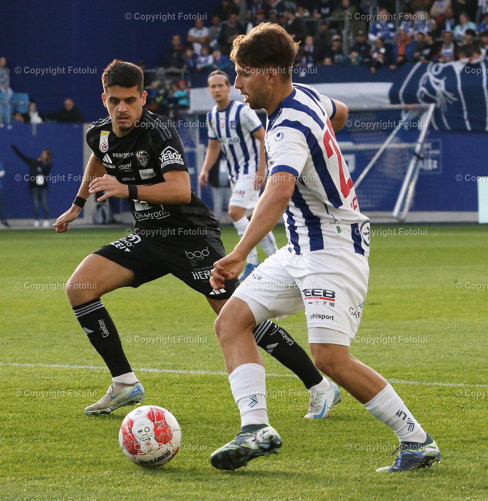 A_LUI_191024_03 | SPORT,FUSSBALL,ADMIRAL BUNDESLIGA BLAU WEISS LINZ-RZ PELLETS WAC 19.10.2024 IM BILD :SIMON SEIDL (BL.WEISSLINZ) UND DEJAN ZUKIC (WAC) FOTOLUI/MW