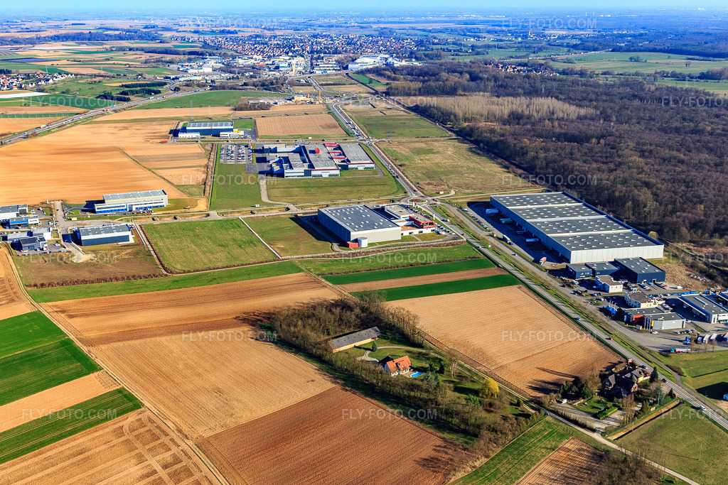 Aerial view: Industrial park Rue de Bruxelles with KS Tools LOGISTIQUE JUNG MOMMENHEIM in Mommenheim in the state Bas-Rhin, France. – Photo: IMG_097623.jpg taken on 03/16/2017 by Werner Riehm/FLY-FOTO.com – Resolution of the original: 5260 x 3507 px – Jung logistique – KS Tools, fabricant d’outillage à main pour les professionnels.  | KS Tools