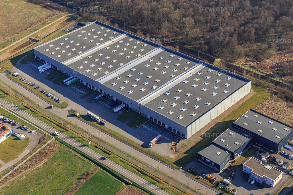 Vue aérienne: Parc industriel de la rue de Bruxelles avec LOGISTIQUE JUNG MOMMENHEIM à Mommenheim dans le département Bas Rhin, France – .Photo: IMG_097628.jpg prise le 16/03/2017 par Werner Riehm/FLY-FOTO.eu – Résolution de l'original: 5202 x 3468 px – Jung logistique