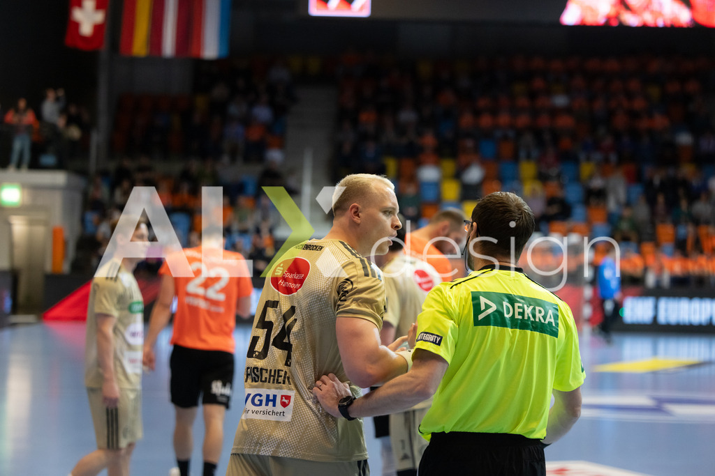 Handball I Herren I Saison 2025-2026 I EHF EUROPEAN LEAGUE 2025/26 | Men I Main Round I 2. Spieltag I Kadetten Schaffhausen - TSV Hannover-Burgdorf I 24.02.2026 | 54 Justus Fischer (DE) (TSV Hannover-Burgdorf) – Kreisläufer - Realisiert mit Pictrs.com