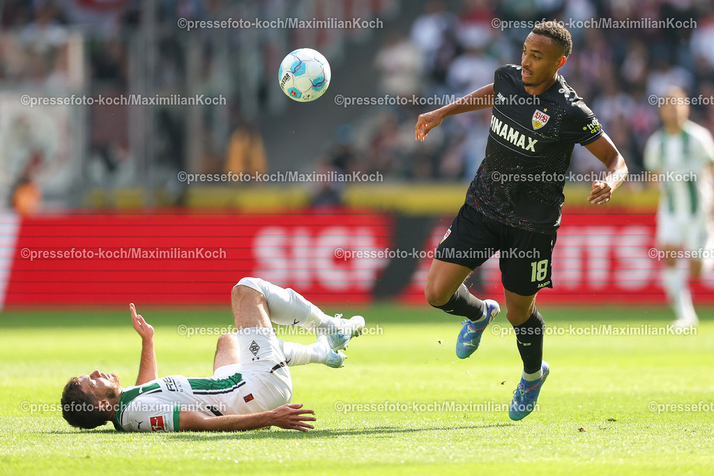 BMG14092401015 | 14.09.2024, 1. Fußball Bundesliga, Borussia Mönchengladbach - VfB Stuttgart, Borussia-Park, Saison 2024 2025: Joe Scally (Bor. Mönchengladbach #29) wird von Jamie Leweling (VfB Stuttgart #18) umgeschubstDFB regulations prohibit any use of photographs as image sequences and or quasi-video.
