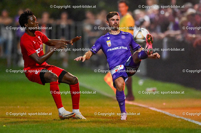 AUT, OEFB Uniqa Cup, Fussball Askoe Oedt vs FK Austria Wien | 28.08.2024, Transdanubia Sportanlage Oedt, AUT, OEFB Uniqa Cup, 2. Runde, Askoe Oedt vs FK Austria Wien, im Bild Adamson Sharafa (Askoe Oedt) vs Andreas Gruber (FK Austria Wien)