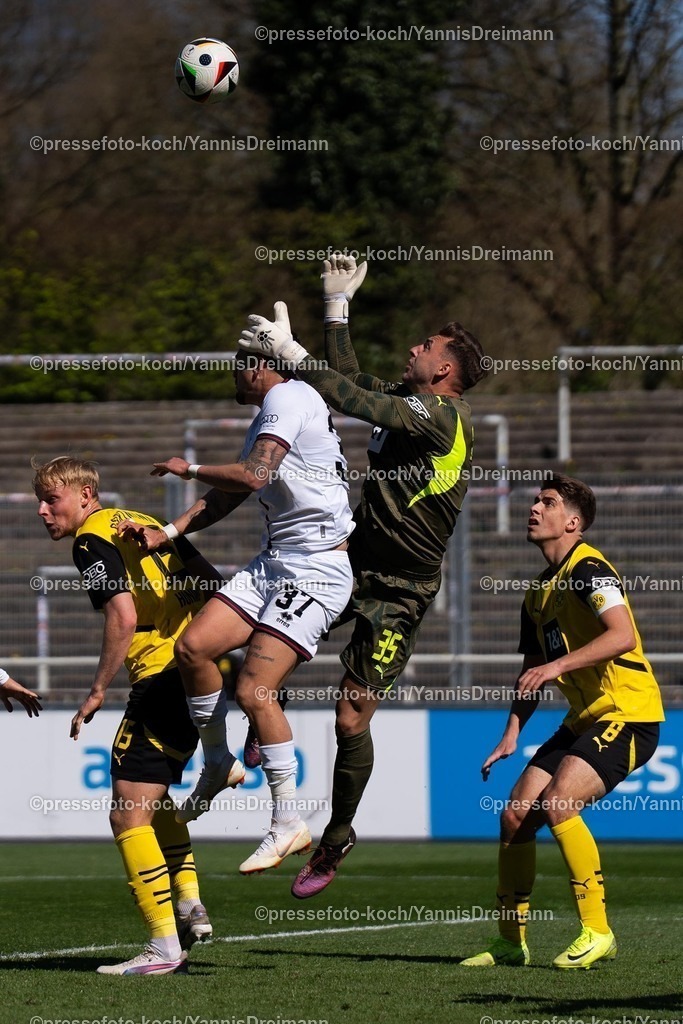 xydr06042501052 | 06.04.2025, xydrx, Fußball, Borussia Dortmund II - FC Ingolstadt 04, 3.Liga, Stadion Rote Erde, Saison 2024 2025: Pascal Testroet (FC Ingolstadt #37) im Zweikampf gegen Marcel Lotka (Borussia Dortmund II #35) DFB regulations prohibit any use of photographs as image sequences and or quasi-video.