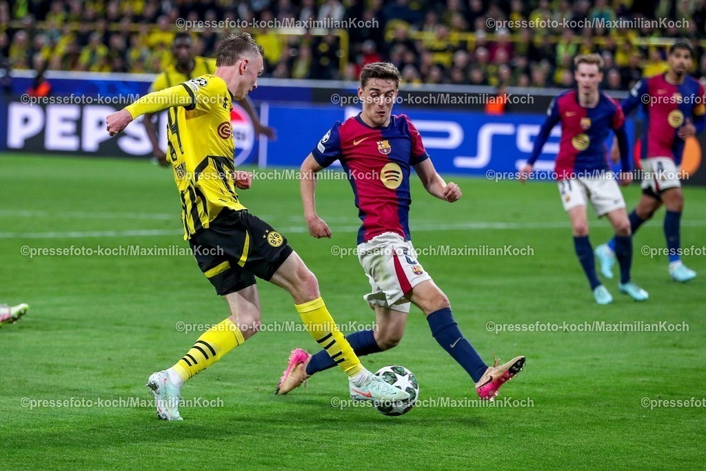 UCL1504251080 | 15.04.2025, Fußball, UEFA Champions League, Borussia Dortmund - FC Barcelona, BVB Stadion, Viertelfinale, Saison 2024 2025: Maximilian Beier (BVB #14) im Zweikampf gegen Gavi Pablo Martin Paez Gavira (FC Barcelona #06) Regulations prohibit any use of photographs as image sequences and or quasi-video.