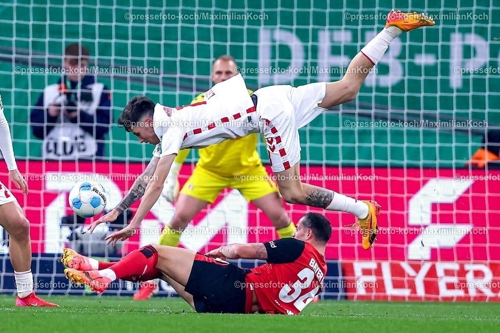 DFB05022501023 | 05.02.2025, Fußball, DFB-Pokal Viertelfinale, Bayer 04 Leverkusen - 1.FC Köln, BayArena, Saison 2024 2025: Denis Huseinbasic (FC Köln #8) im Zweikampf gegen Granit Xhaka (Bayer04 Leverkusen #34)DFB regulations prohibit any use of photographs as image sequences and or quasi-video.