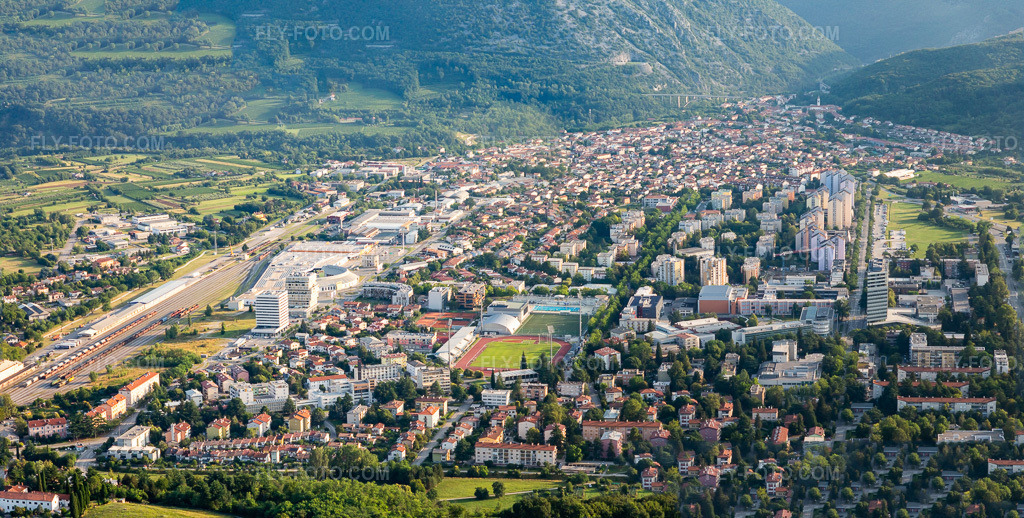 Aerial view: City center from the south in Nova Gorica in the state Slovenia, Slovenia. – Photo: IMG_137618-Pano.jpg taken on 07/16/2023 by Werner Riehm/FLY-FOTO.com – Resolution of the original: 8715 x 4410 px