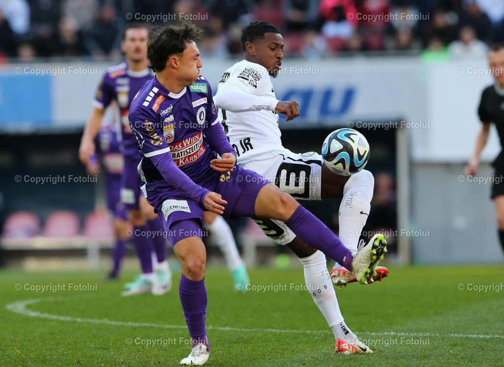 A_LUI_121123_04 | SPORT,FUSSBALL,ADMIRAL BUNDESLIGA AUSTRIA KLAGENFURT-STURM GRAZ 12.11.2023IM BILD: BRYAN SILVA TEIXEIRA (STURM GRAZ ) UND SIMON STAUDI (KLAGENGURT)FOTO: FOTOLUI