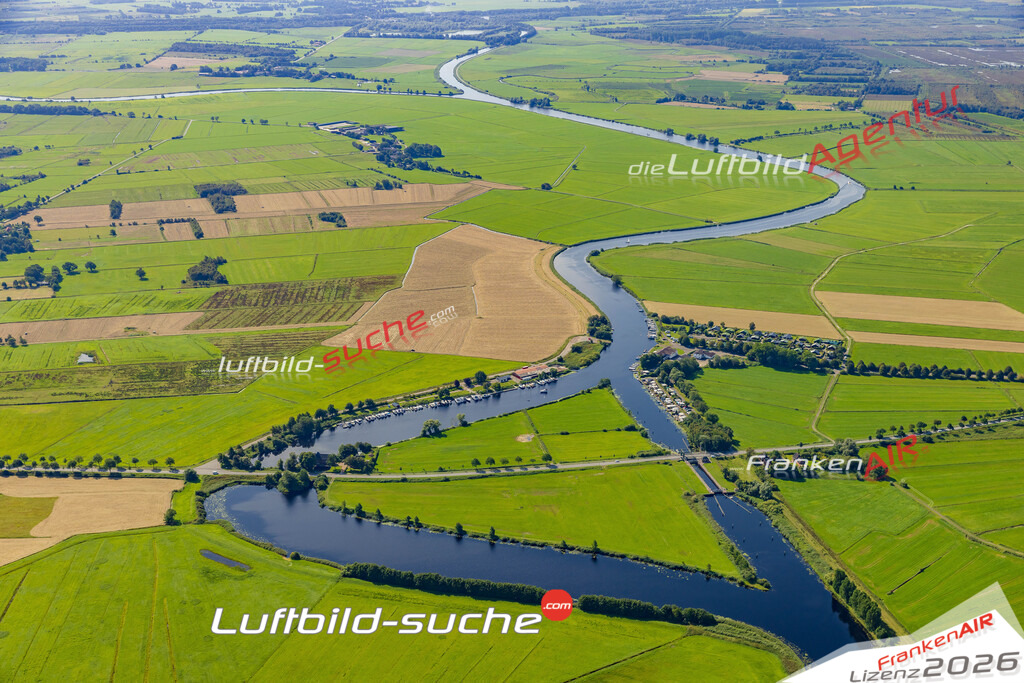 Lexfähre Alter Eiderdamm Wrohm Bild- Das Luftbild wurde 2025 vom UL-Flugzeug heraus erstellt ( keine Drohne bzw. Drohnenaufnahme ) - Hochauflösende Luftaufnahme -Nicht vergleichbar mit Google Maps oder Satelittenbilder- Die Geschenkidee !Mit Lizenz und Bildrechte bestellbar - CC