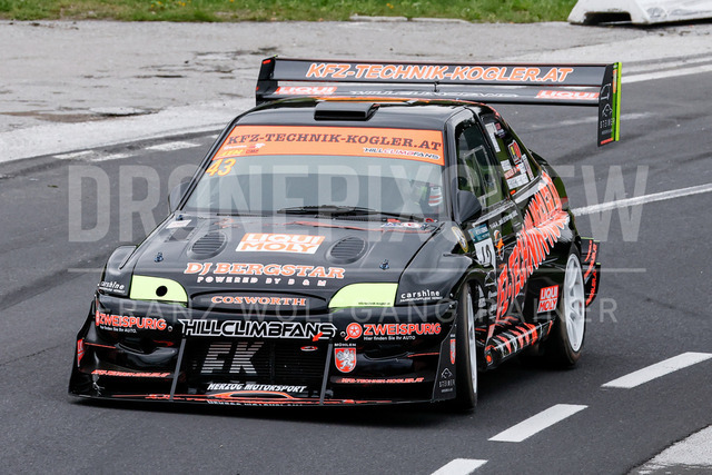 Rechberg Hill Climb 2025 – FIA European Hill Climb Championship | Rechberg Hill Climb 2025, part of the FIA European Hill Climb Championship. High-speed racing action, mountain scenery, atmosphere and pure motorsport passion captured in detail. The image shows Franz Kogler (AUT) Ford Escort Cosworth.          