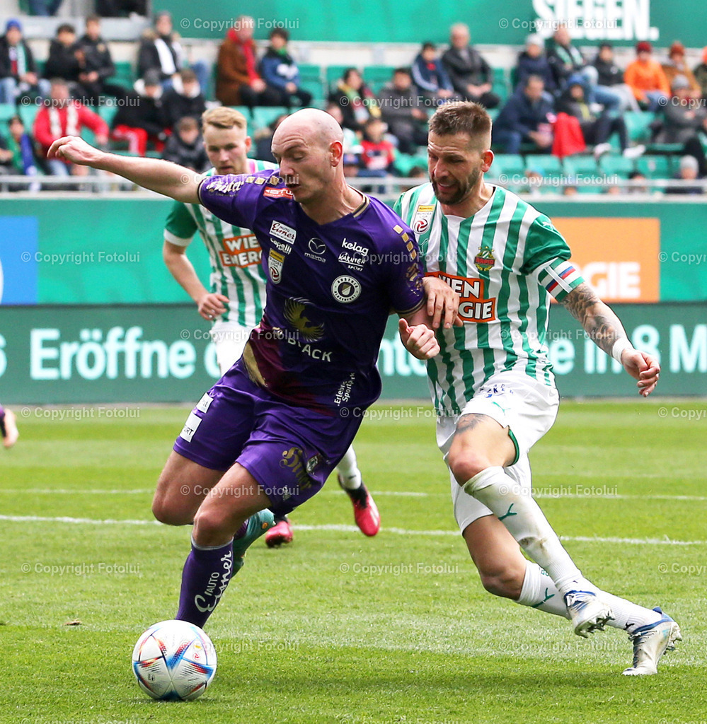A_LUI_09042023_09 | SPORT,FUSSBALL,ADMIRAL BUNDESLIGA SK RAPID WIEN- AUSTRIA KLAGENFURT 09.04.2023 IM BILD: NICOLAS WIMMER  (KLAGENFURT) UND GUIDO BURGSTALLER (SK RAPID WIEN ) FOTO:FOTOLUI/MW