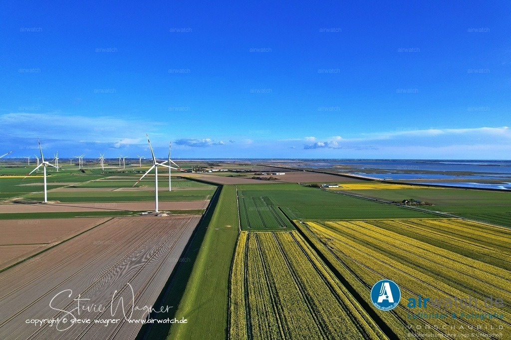 Windpark Reussenköge - Bürgerwindpark Reußenköge | Entdecken Sie atemberaubende Luftbilder und Fotografien auf airwatch.de - Tauchen Sie ein in eine Welt voller faszinierender Aufnahmen aus der Vogelperspektive.