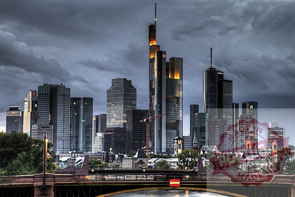 Frankfurt am Main financial district skyline under dramatic sky | Frankfurt am Main skyline at dusk with skyscrapers and a Moody sky - Realized with Pictrs.com