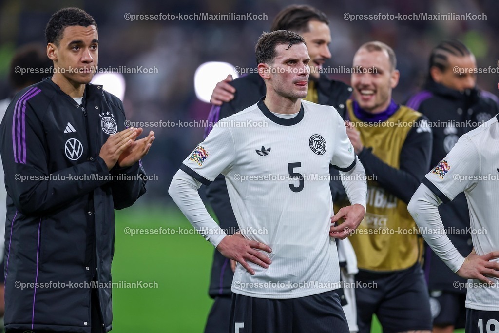 DFB23032502230 | 23.03.2025, Fußball, Viertelfinale UEFA Nations League, Deutschland - Italien, Signal Iduna Park, Saison 2024 2025: Jamal Musiala (GER #10) Pascal Groß (GER #05) David Raum (GER #22) DFB regulations prohibit any use of photographs as image sequences and or quasi-video.