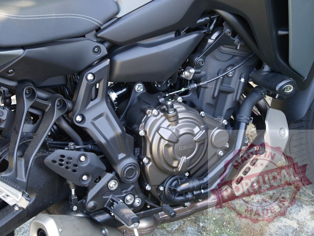 Powerful Yamaha CP4 engine showcasing engineering and design of modern motorcycle | Close-up of a Yamaha CP4 engine, highlighting the intricate details and robust construction of a modern motorcycle's powerplant - Realized with Pictrs.com