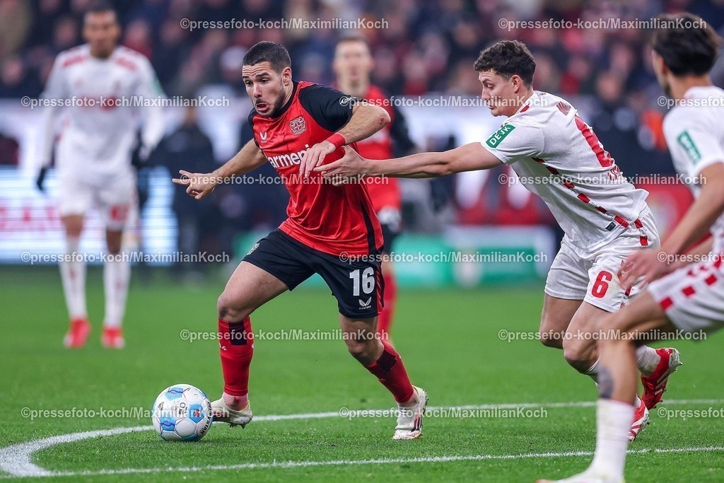 DFB05022502223 | 05.02.2025, Fußball, DFB-Pokal Viertelfinale, Bayer 04 Leverkusen - 1.FC Köln, BayArena, Saison 2024 2025: Emiliano Buendia Stati (Bayer04 Leverkusen #16) im Zweikampf gegen Eric Martel (FC Köln #6)DFB regulations prohibit any use of photographs as image sequences and or quasi-video.