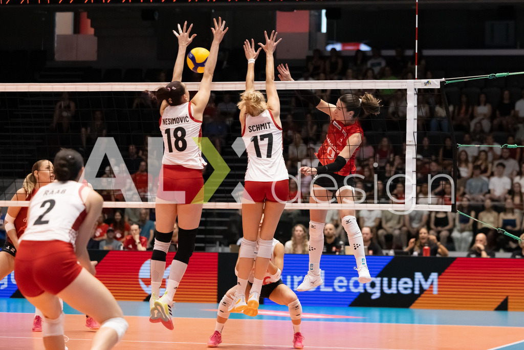 Austria v Switzerland - CEV European League Women | KRIENS, SWITZERLAND - JUNE 14: SARINA WIELAND of Switzerland attack / spike against NINA NESIMOVIĆ and DANA SCHMIT of Austria double block during the CEV European League match between Austria and Switzerland at Pilatus Arena on June 14, 2026 in Kriens, Switzerland. - Realisiert mit Pictrs.com