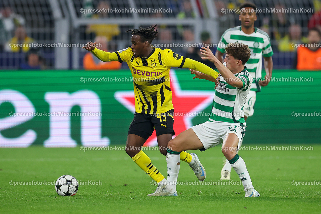 BVB01102402164 | 01.10.2024, Fußball, UEFA Champions League, Borussia Dortmund - Celtic Glasgow, 2. Spieltag, Signal Iduna Park, Saison 2024 2025: Jamie Gittens (BVB #43) gegen Arne Engels (Celtic #27)