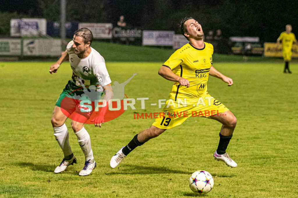 SV Feldkirchen - SC Launsdorf 2-1, Unterliga Ost | Michael Tammegger (SV Feldkirchen #6) Felix Auer (SC Launsdorf #13) SV Feldkirchen - SC Launsdorf 2-1 am 23.08.2023 in Feldkirchen
(Modehaus NIMO Arena), Austria, (Photo by Ernst Krawagner sport-fan.at) - Realisiert mit Pictrs.com