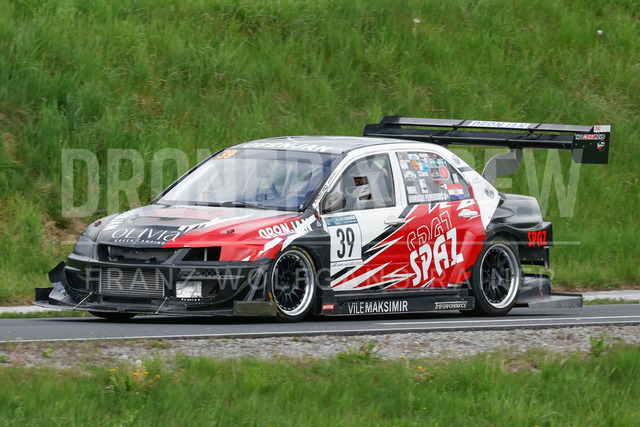 Rechberg Hill Climb 2025 – FIA European Hill Climb Championship | Rechberg Hill Climb 2025, part of the FIA European Hill Climb Championship. High-speed racing action, mountain scenery, atmosphere and pure motorsport passion captured in detail. The image shows Domagoj Perekovic (CRO) Mitsubishi Lancer Evo 9.          