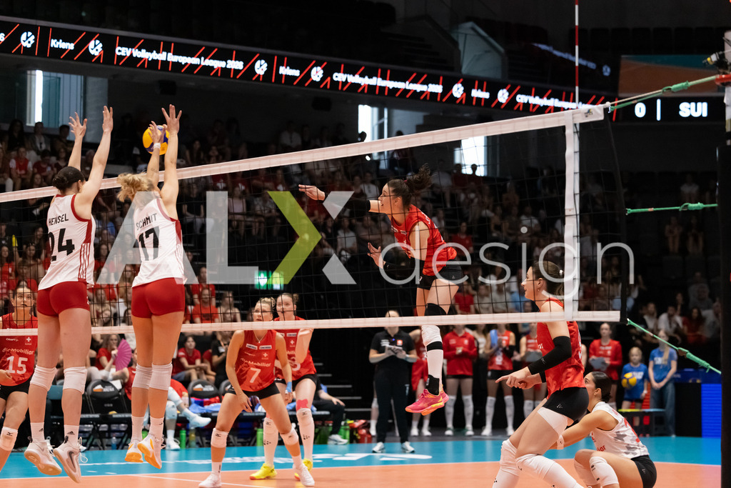 Austria v Switzerland - CEV European League Women | KRIENS, SWITZERLAND - JUNE 14: SARINA WIELAND of Switzerland attack / spike against DAGMAR HENSEL and DANA SCHMIT of Austria double block during the CEV European League match between Austria and Switzerland at Pilatus Arena on June 14, 2026 in Kriens, Switzerland. - Realisiert mit Pictrs.com