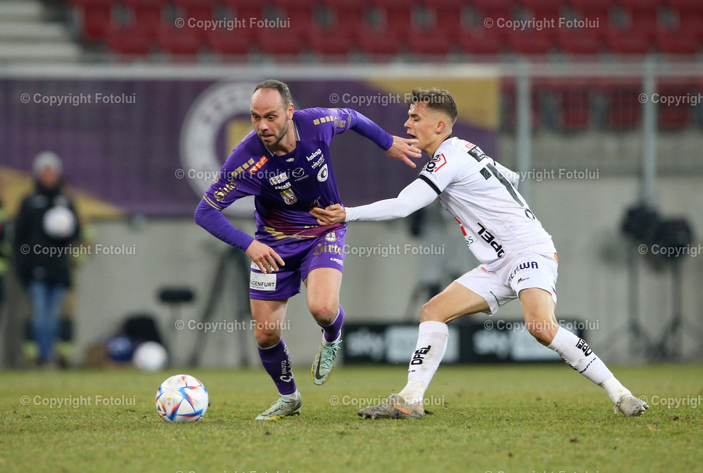 A_LUI_18022023_05 | SPORT,FUSSBALL,ADMIRAL BUNDESLIGA AUSTRIA KLAGENFURT-WOLFSBERGER AC 18.02.2023
IM BILD. RICO BENATELLI  (KLAGENFURT) UND ERVIN OMIC (WOLFSBERG) FOTO.FOTOLUI/MARIO WIMMER