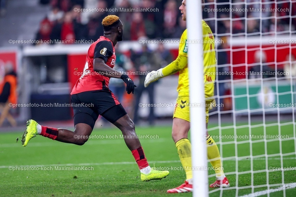 DFB05022501103 | 05.02.2025, Fußball, DFB-Pokal Viertelfinale, Bayer 04 Leverkusen - 1.FC Köln, BayArena, Saison 2024 2025: Torjubel nach dem 3:2 durch Victor Boniface (Bayer04 Leverkusen #22)DFB regulations prohibit any use of photographs as image sequences and or quasi-video.
