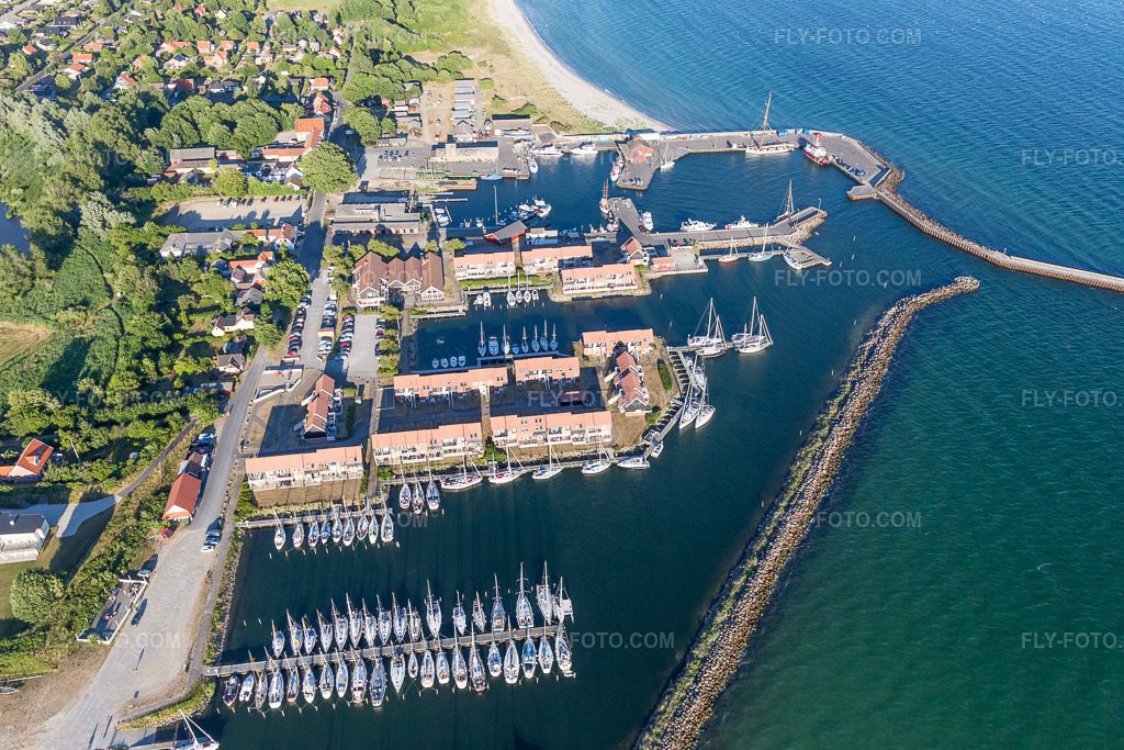 Aerial view: Marina with moorings and berths for sports boats on the Baltic Sea coast in Klintholm Havn on the island of Mon in Borre in the state Zealand, Denmark.Photo: IMG_108542.jpg taken on 07/04/2018 by Werner Riehm/FLY-FOTO.comResolution of the original: 5472 x 3648 px