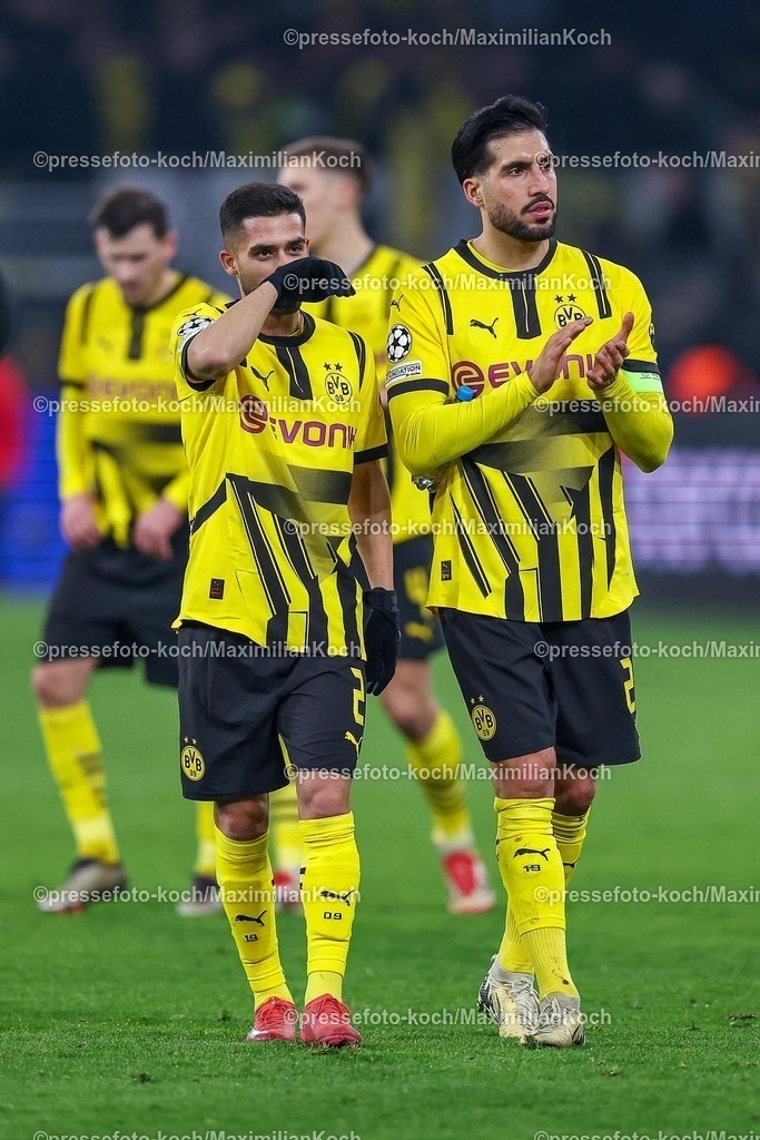 UCL04032502242 | 04.03.2025, Fußball, UEFA Champions League, Borussia Dortmund - OSC Lille, Signal Iduna Park, Runde der 16, Saison 2024 2025: Yan Couto (BVB #2) und Emre Can (BVB #23) nach dem Spiel Enttäuschung Enttäuscht