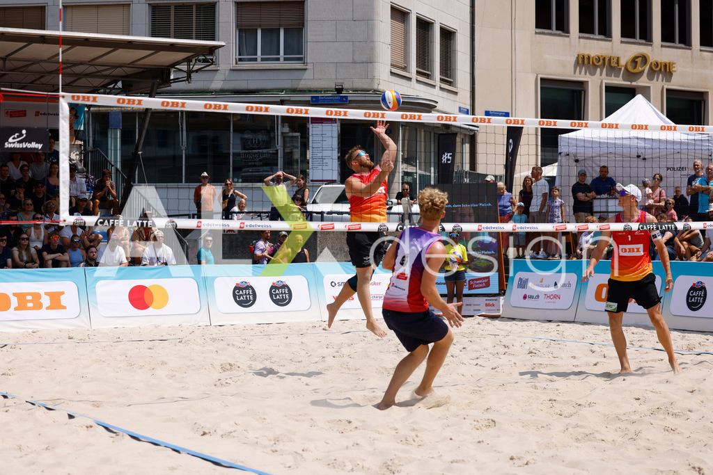 Obi BeachTour 2026 - Basel | BASEL, SWITZERLAND - JULY 19: MORITZ KINDL (AUT) attack / spike during the Obi BeachTour 2026 match between LEITNER / KINDL (AUT) and BREER / KÄLIN (SUI) at Barfüsserplatz on July 19, 2026 in Basel, Switzerland. - Realisiert mit Pictrs.com