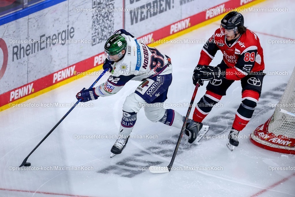 KEC20042601054 | 20.04.2026, Eishockey, DEL Halbfinale Play-Offs, Kölner Haie - Eisbären Berlin, Spiel 6, Lanxess-Arena Köln: Marcel Noebels (Eisbären Berlin #92) im Zweikampf gegen  Gregor MacLeod (Kölner Haie #89) 