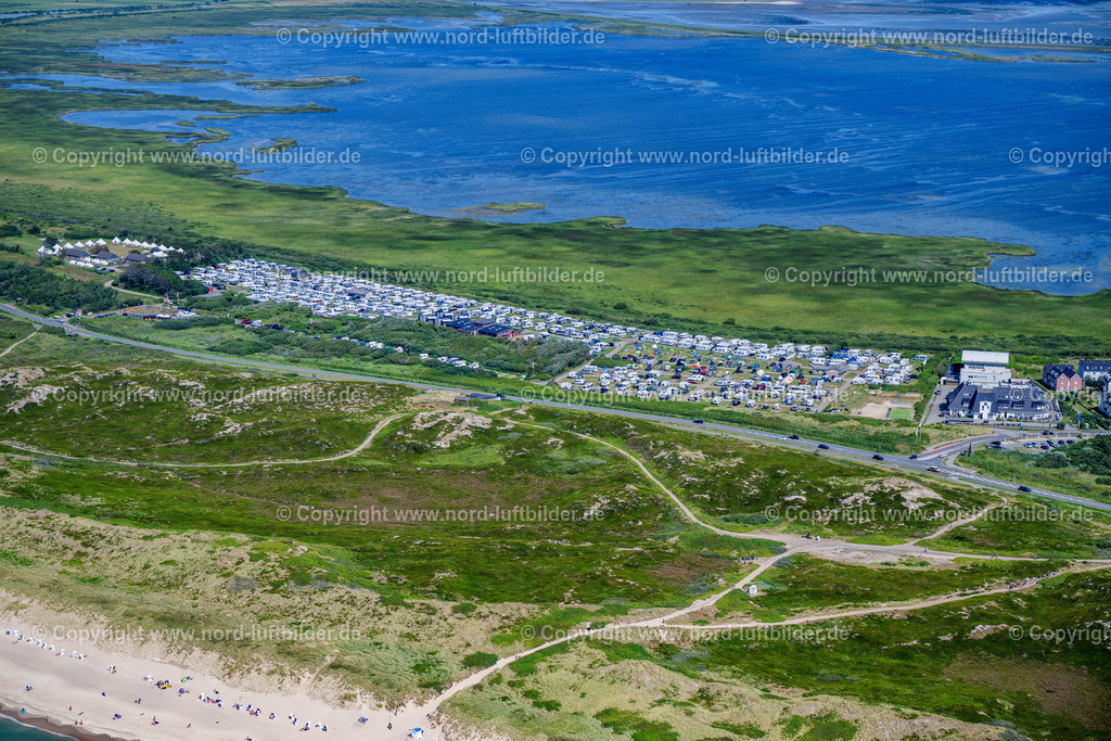 Sylt_Rantum_Campingplatz_Rantum_ELS_6145130825 | RANTUM (SYLT) 13.08.2025 Campingplatz mit Wohnwagen und Zelten im Küstenbereich der Nordsee und dem Rantumbecken am Campingplatz in Rantum (Sylt) im Bundesland Schleswig-Holstein, Deutschland. Weiterführende Informationen bei: Campingplatz Rantum. // Campsite with caravans and tents in the coastal area of the North Sea and the Rantum Basin at the campsite in Rantum (Sylt) in the federal state of Schleswig-Holstein, Germany. Further information at: Campingplatz Rantum. Foto: Martin Elsen