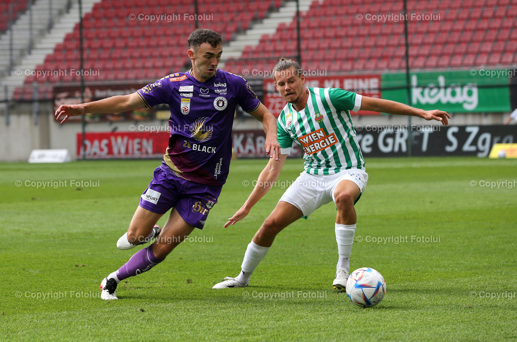 A_LUI_31072022_02 | SPORT,FUSSBALL,ADMIRAL BUNDESLIGA AUSTRIA KLAGENFURT-RAPID 31.07.2022 IM BILD: ANDREW IRVING (KLAGENFURT) UND PATRICK GREILL (RAPID) FOTO: FOTOLUI/MARIO WIMMER